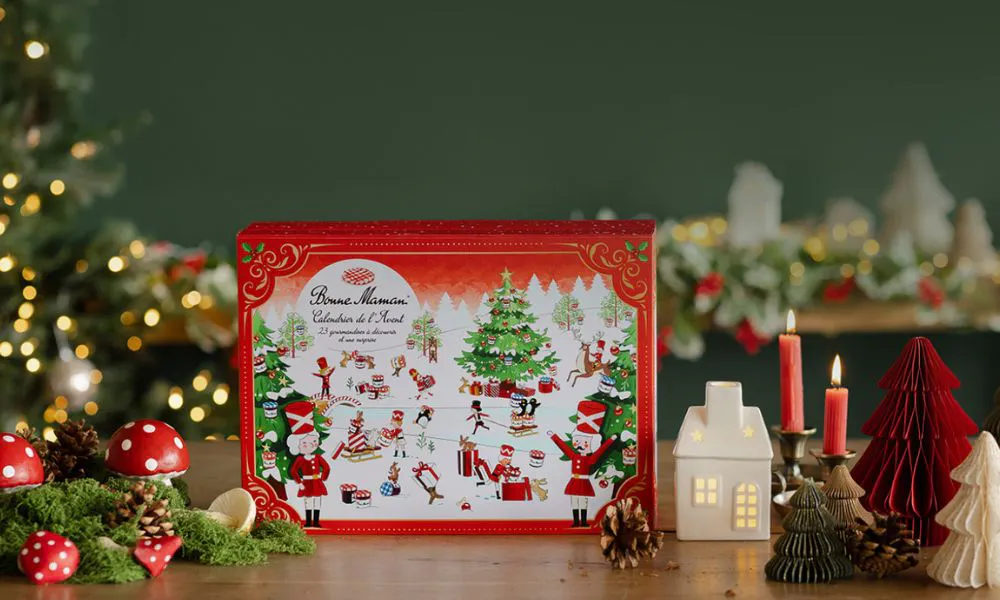 advent calendar surrounded by christmas decorations