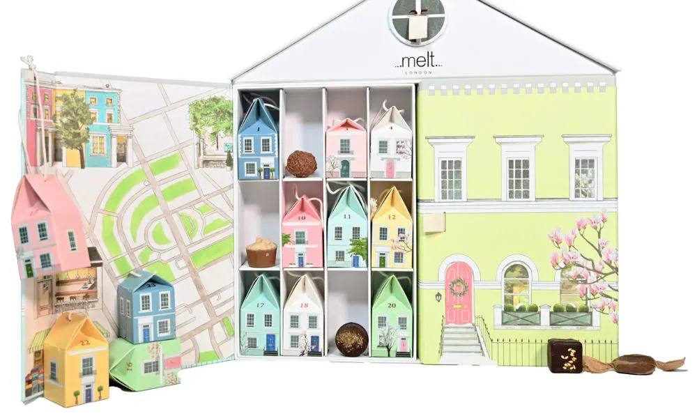cardboard house with mini house parcells