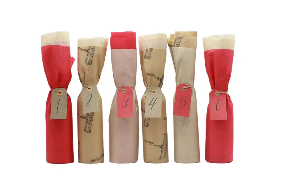wine bottles in christmas cracker wrapping