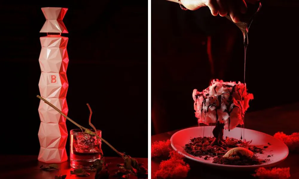 halloween themed cocktail and waiter pouring sauce over tree themed dish