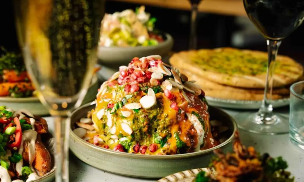 whole cauliflower with sauce drizzled on top
