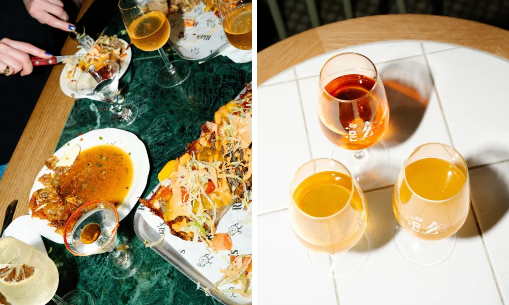 glasses of orange wine and big detroit pizza