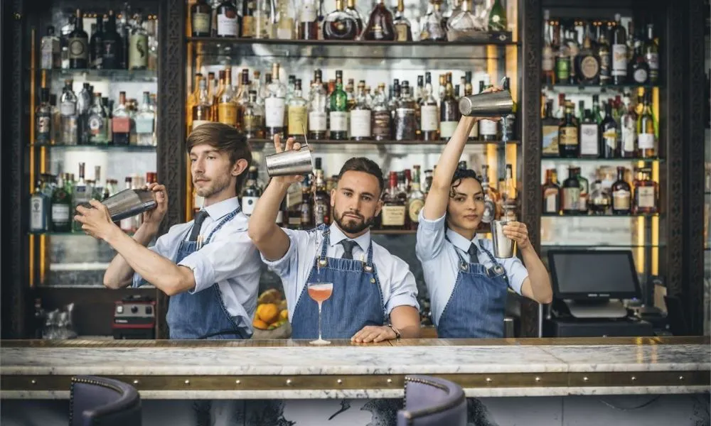 mixologists making cocktails at Artesian 