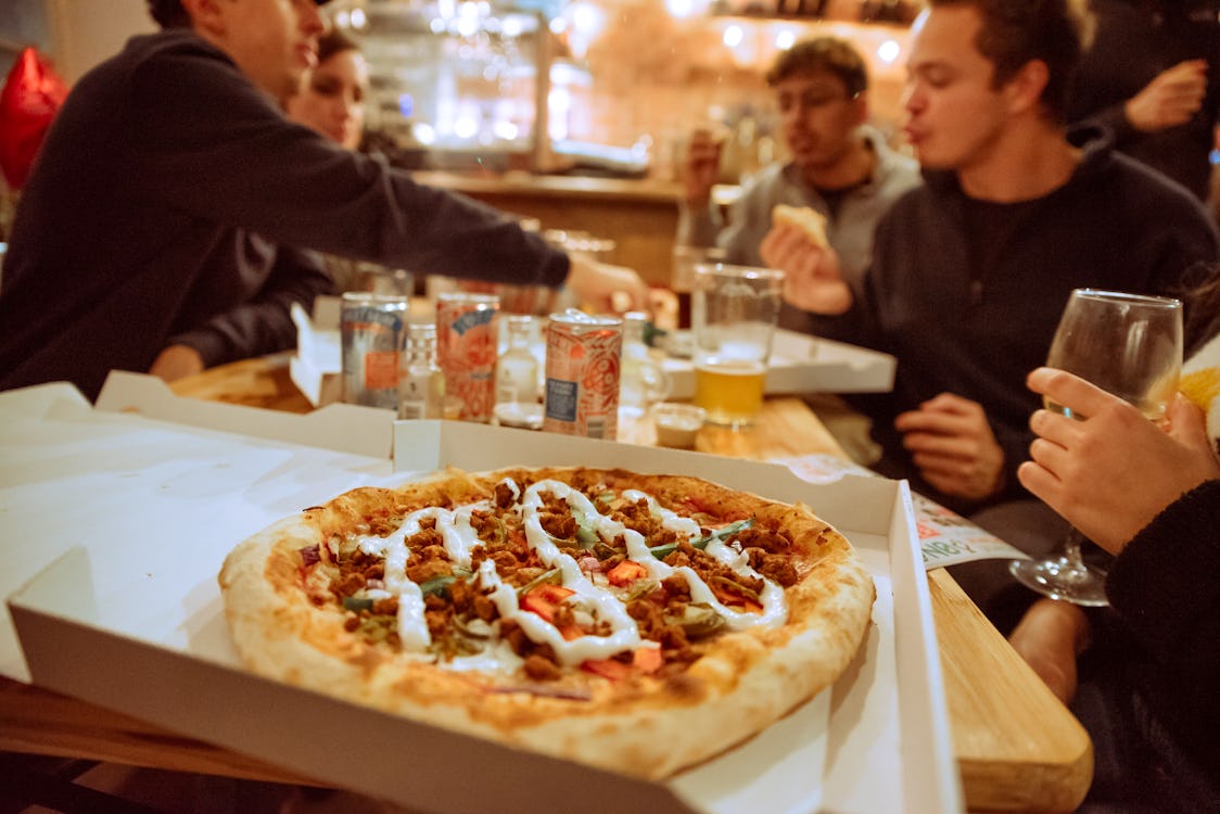This pizza shop is letting you use vouchers from other pizza restaurants for a free meal
