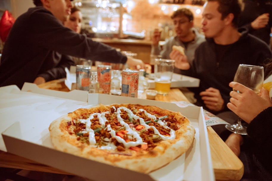 This pizza shop is letting you use vouchers from other pizza restaurants for a free meal