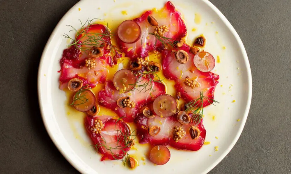 smoked fish and olive oil on plate