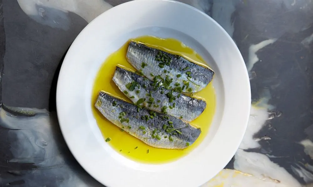 mackerel on a plate with olive oil