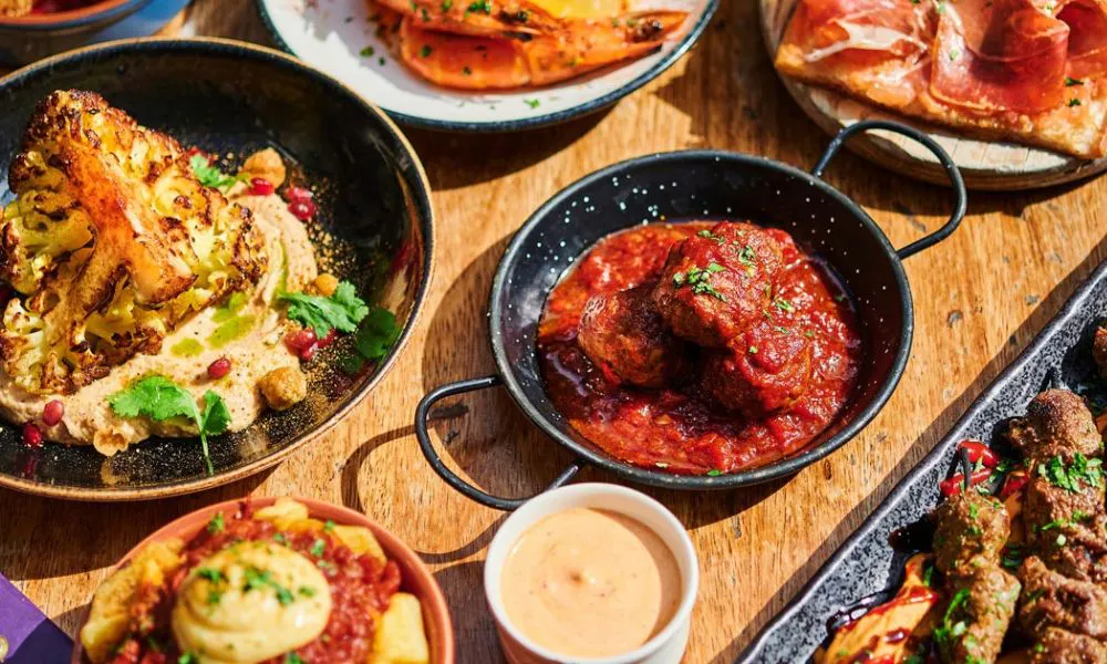 a selection of tapas dishes on a table
