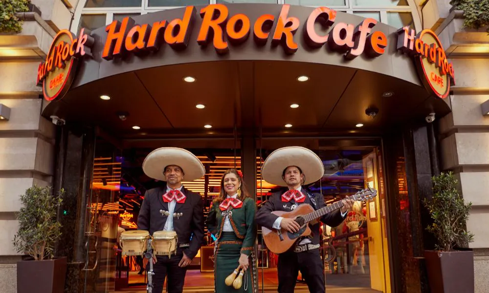 Mariachi band stood outside hard rock cafe