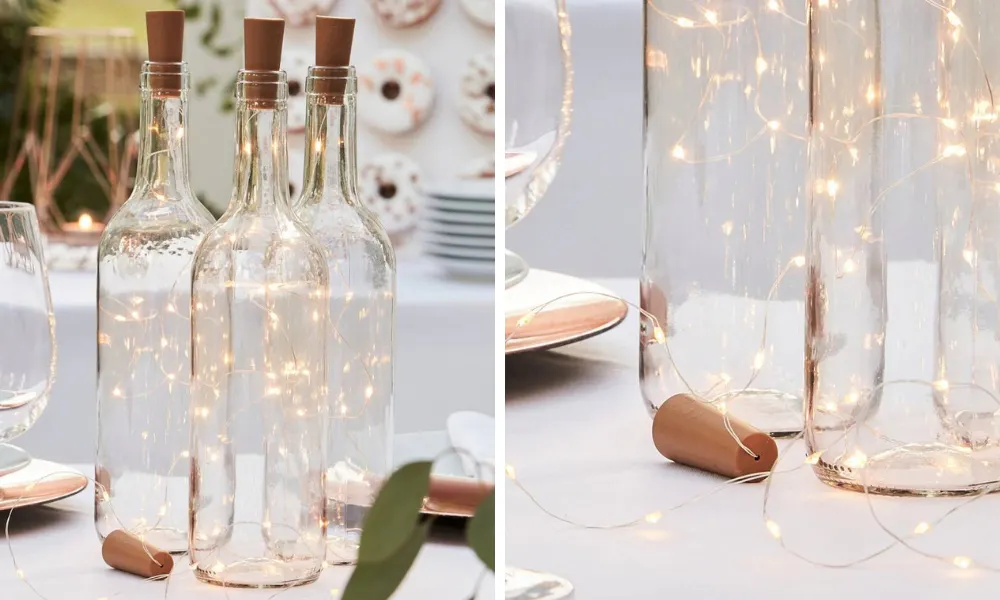 clear glass bottles filled with battery fairy lights