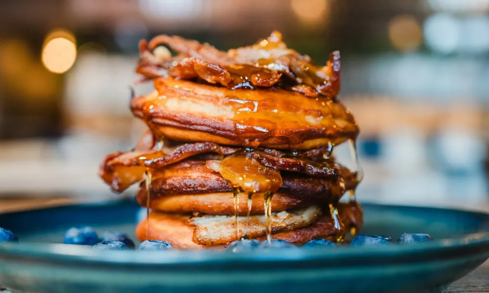 bacon pancake triple stack with blueberries