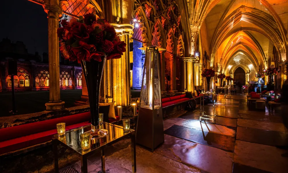 Westminster abbey cloisters lit with red