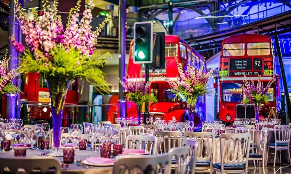 banquet tables with red london busses behind