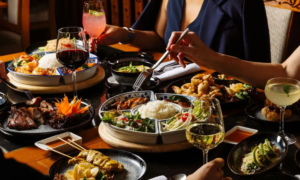 a selection of Thai dishes on a table