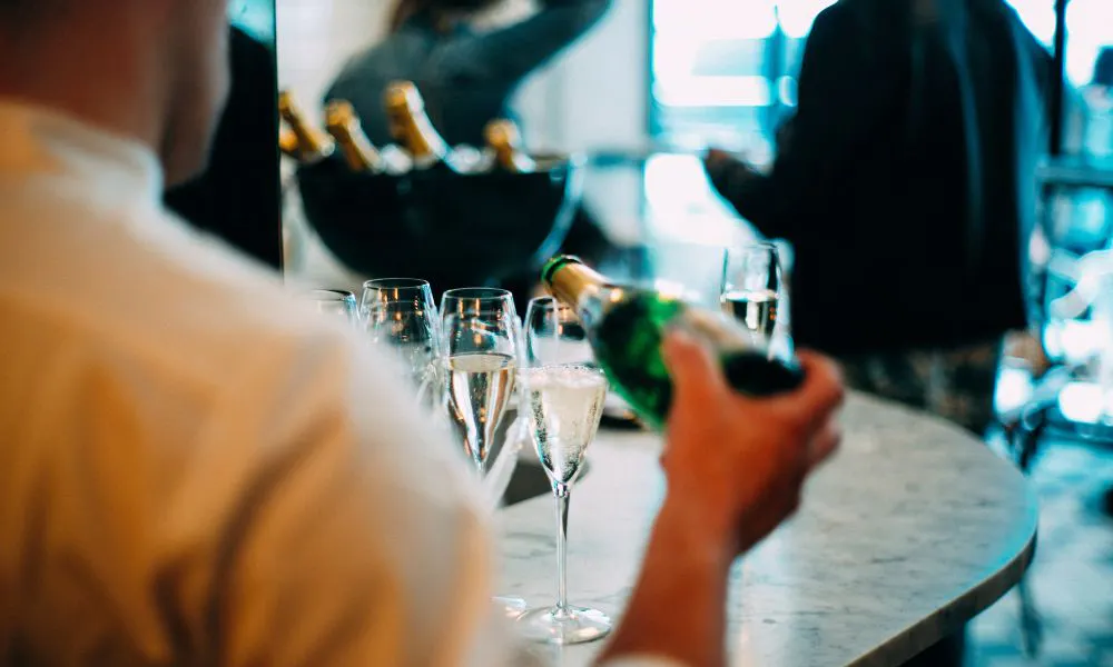 pouring champagne
