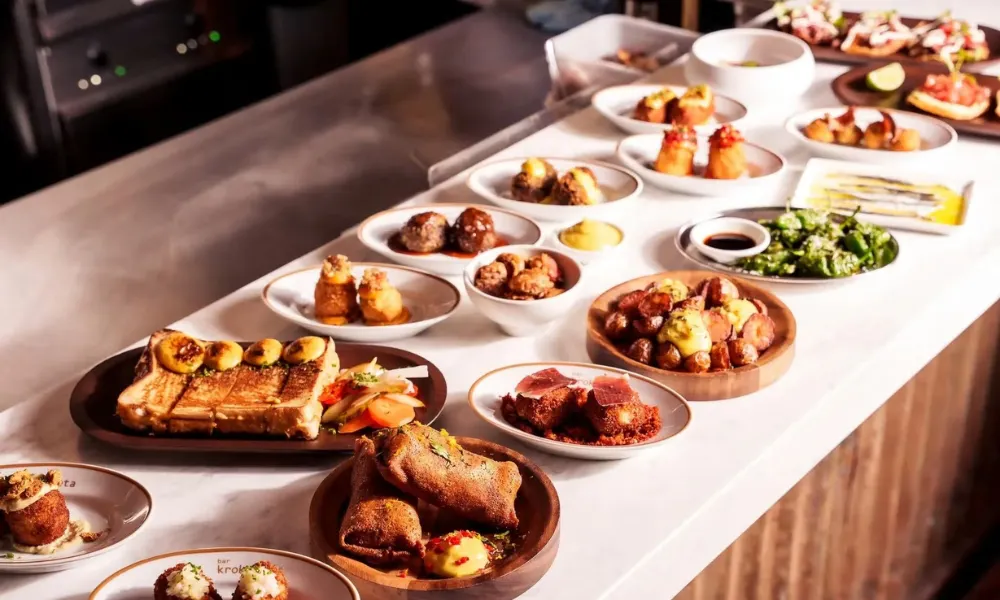 tapas dishes laid out as finger food on a table