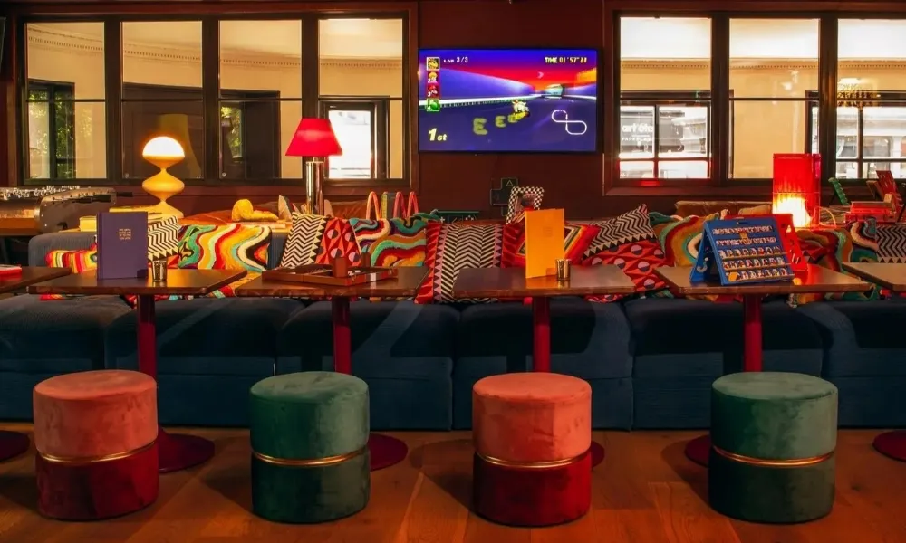 Mario Kart on screen at Little Neon Door