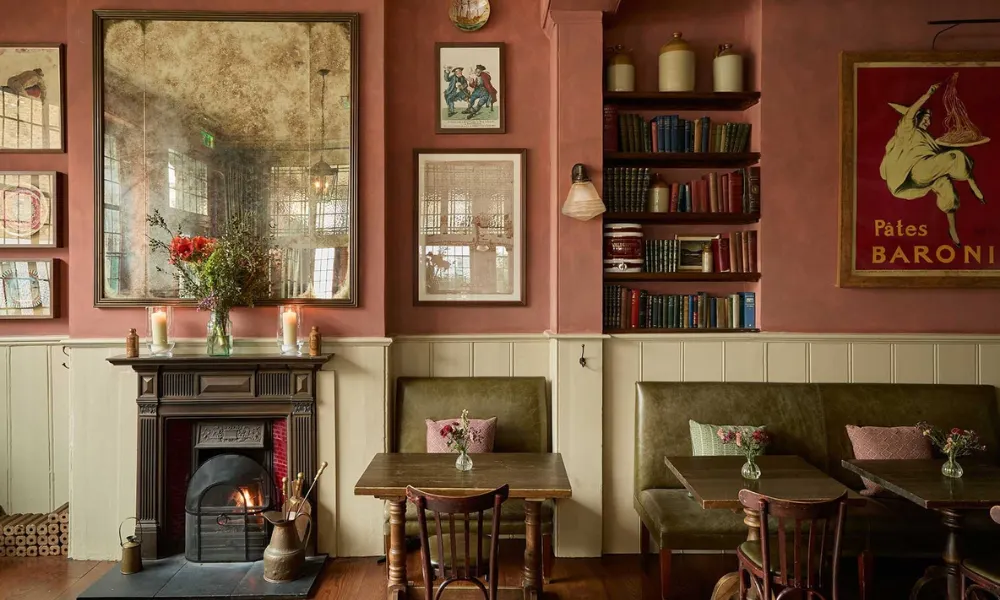 Pub dining room with real fire at The Surprise