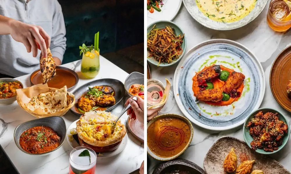 diner eating naan bread and array of indian dishes