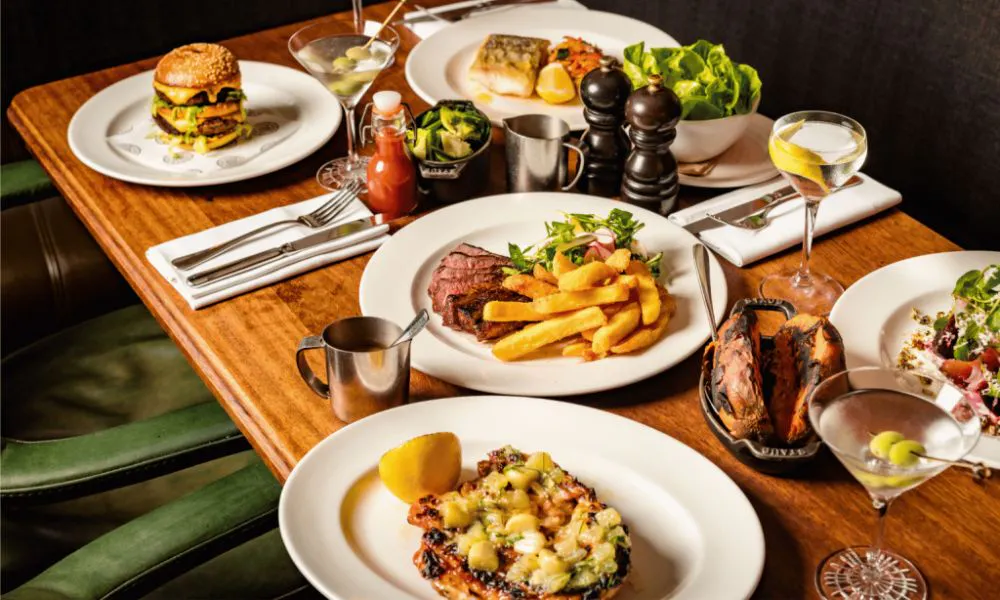 Steak and chips on table