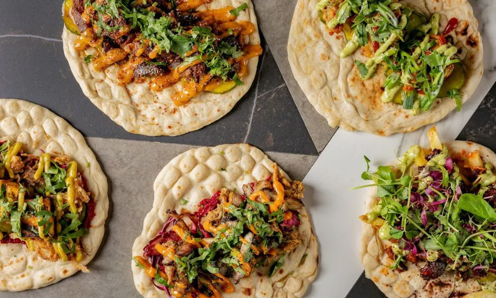 kebabs with a range of meat salad and sauces