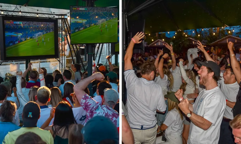 Crowds watching the game outside at barge east