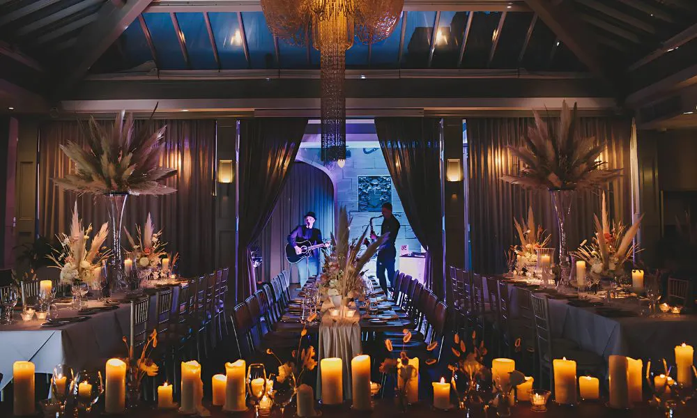 band plays with table laid with dried flowers