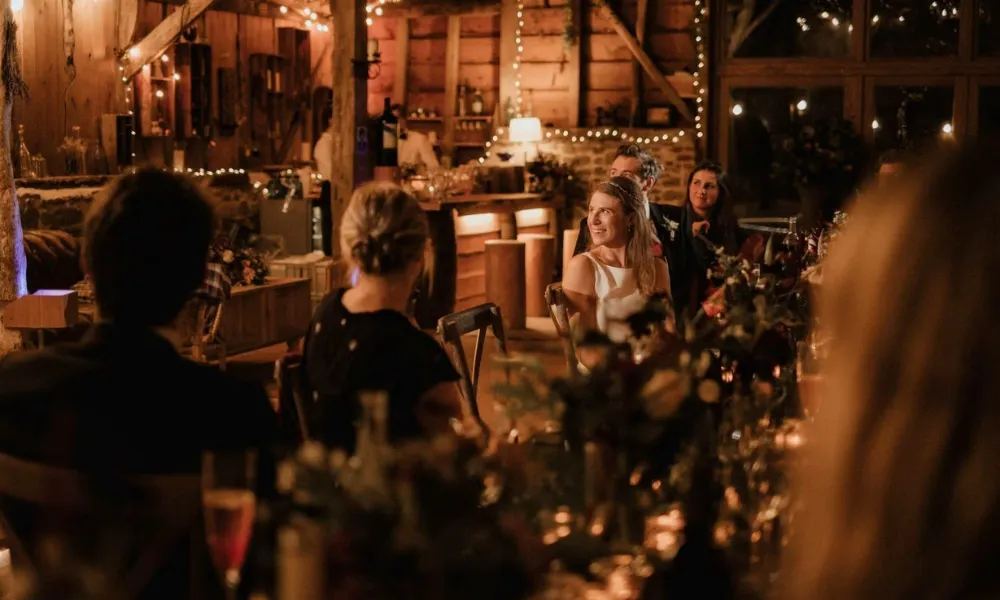 barn wedding breakfast with winter fairy lights