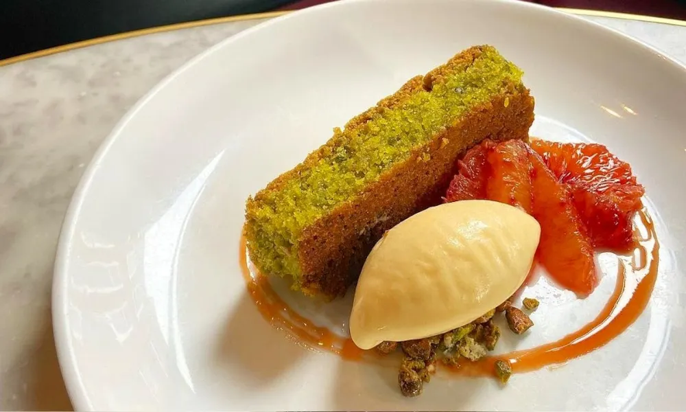 pistachio and blood orange dessert at noble rot