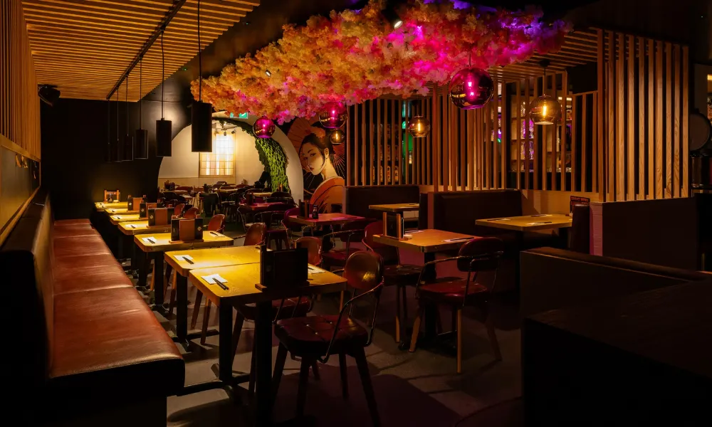 Japanese restaurant dining room with flowers