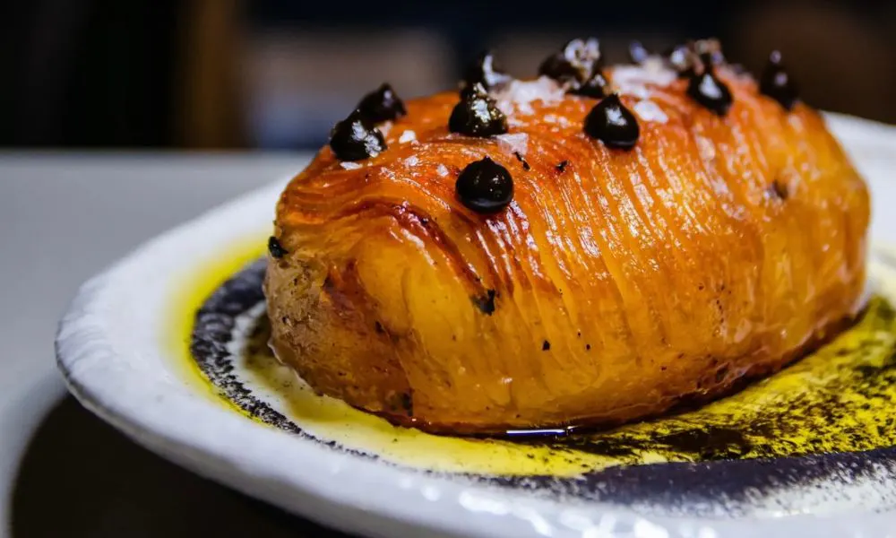 hasselback potato with black garlic