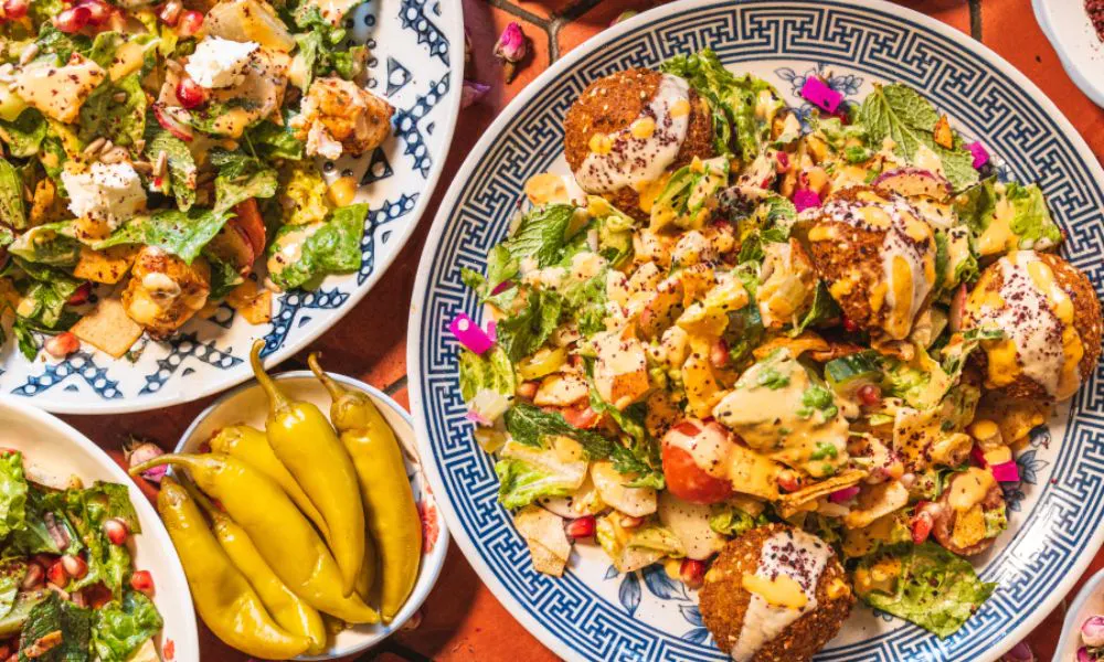 middle eastern salad with falafel and chilli peppers