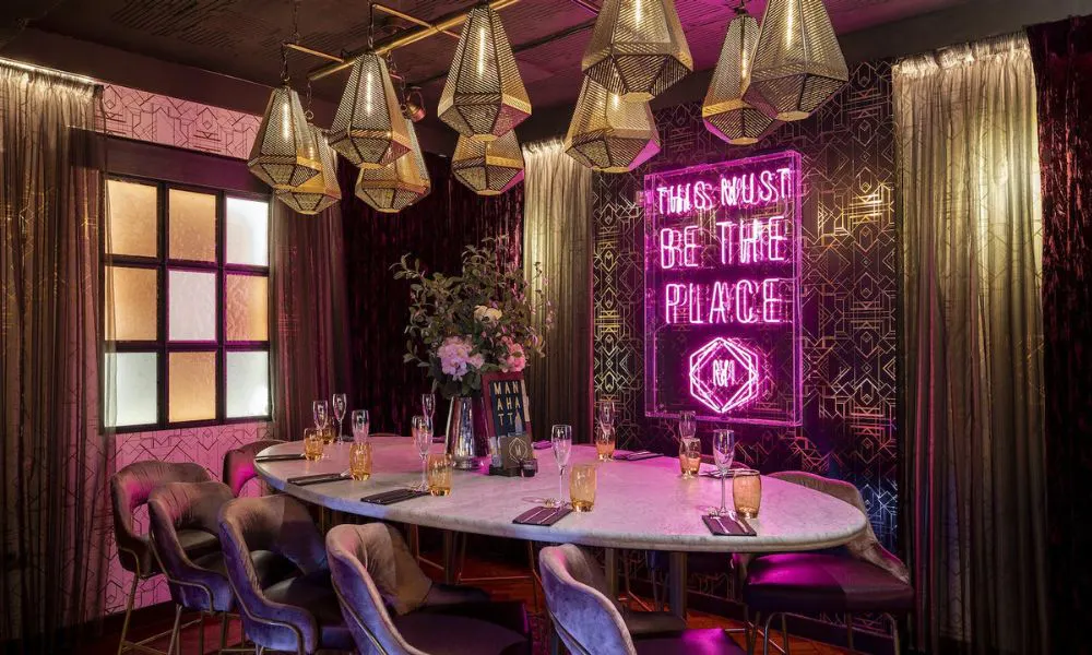 Dining room with neon sign