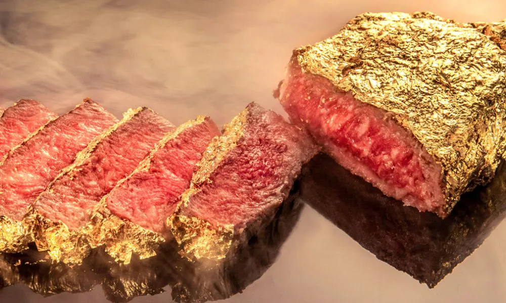Steak wrapped in some gold leaf