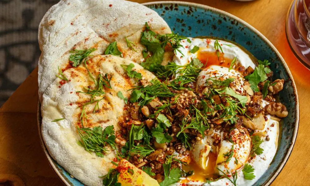 Yoghurt and flatbreads in a bowl