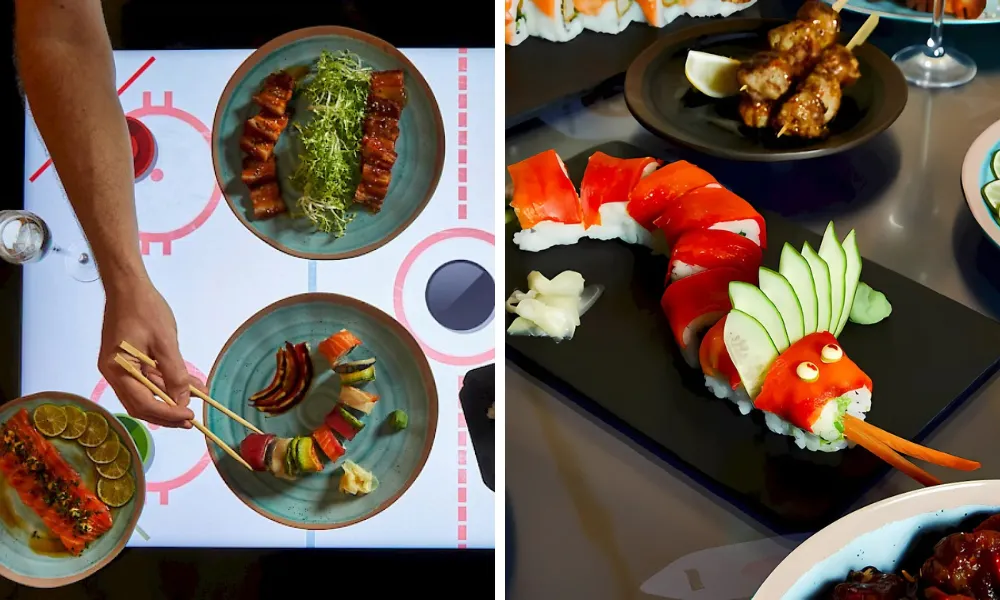 hand with chopsticks reaching across a table