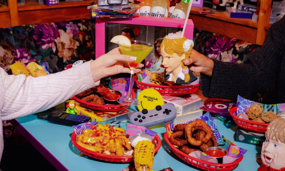 90s themed cocktails and games