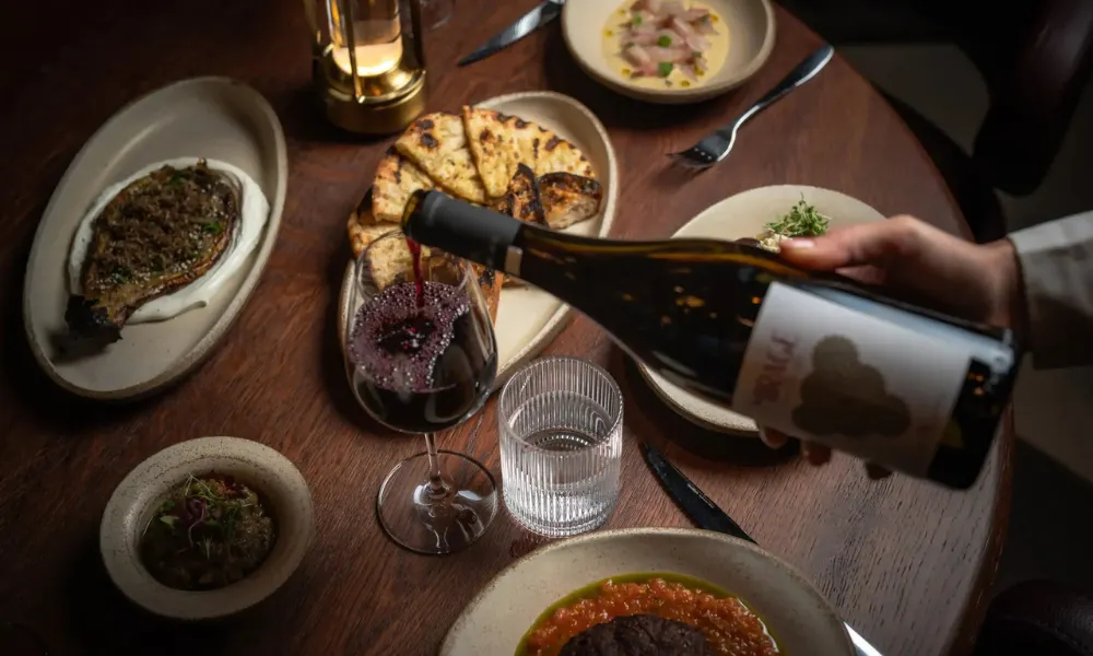 greek dishes bread and red wine