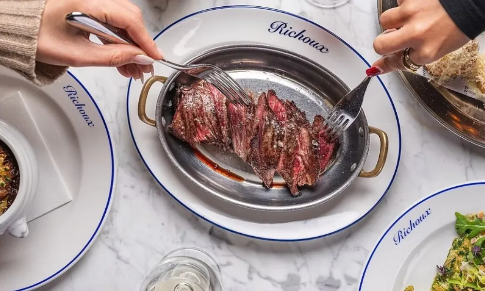 steak on a metal dish at Richoux