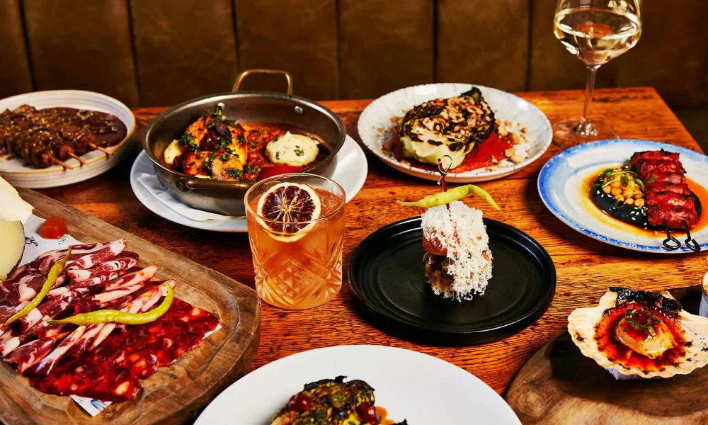 table laid out with sharing and tapas dishes
