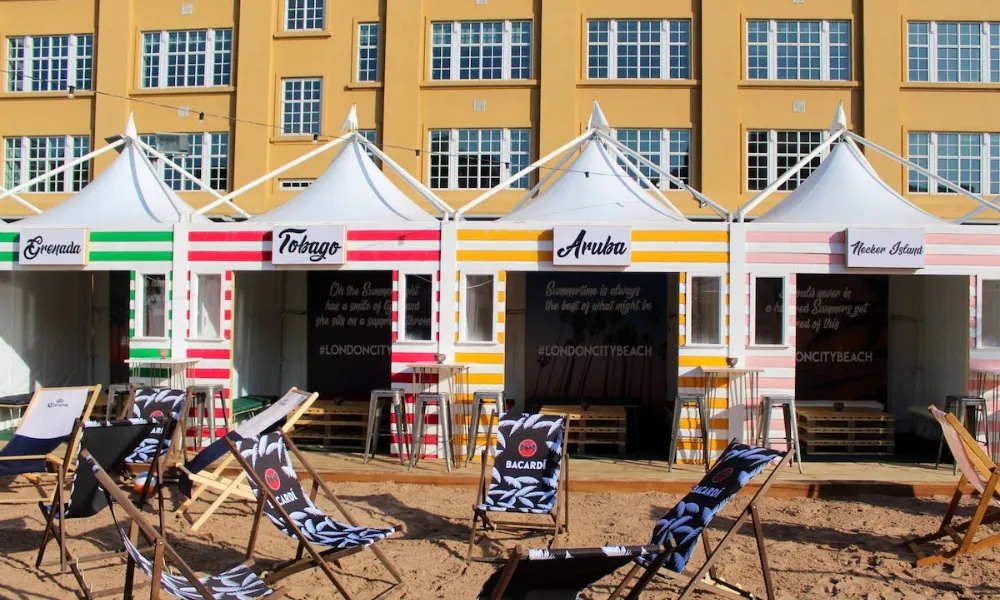 coloured beach huts at london city beach