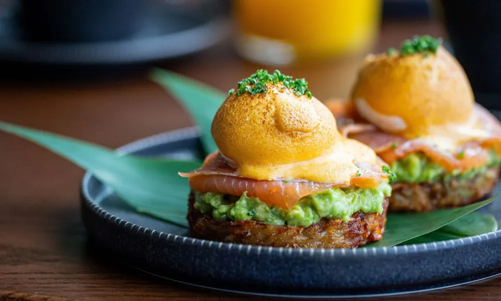 eggs on potato rosti with salmon and avocado