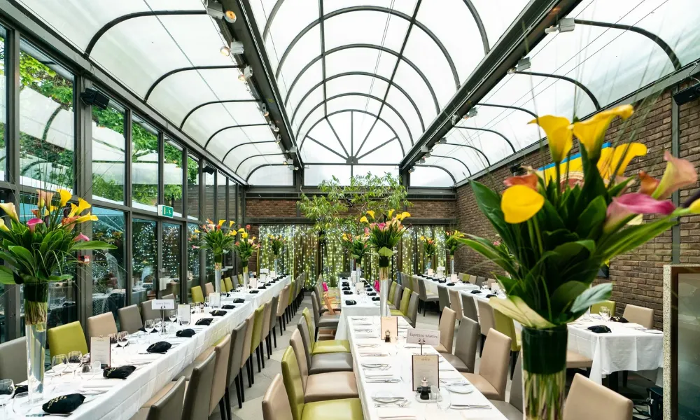 conservatory restaurant set up for wedding breakfast