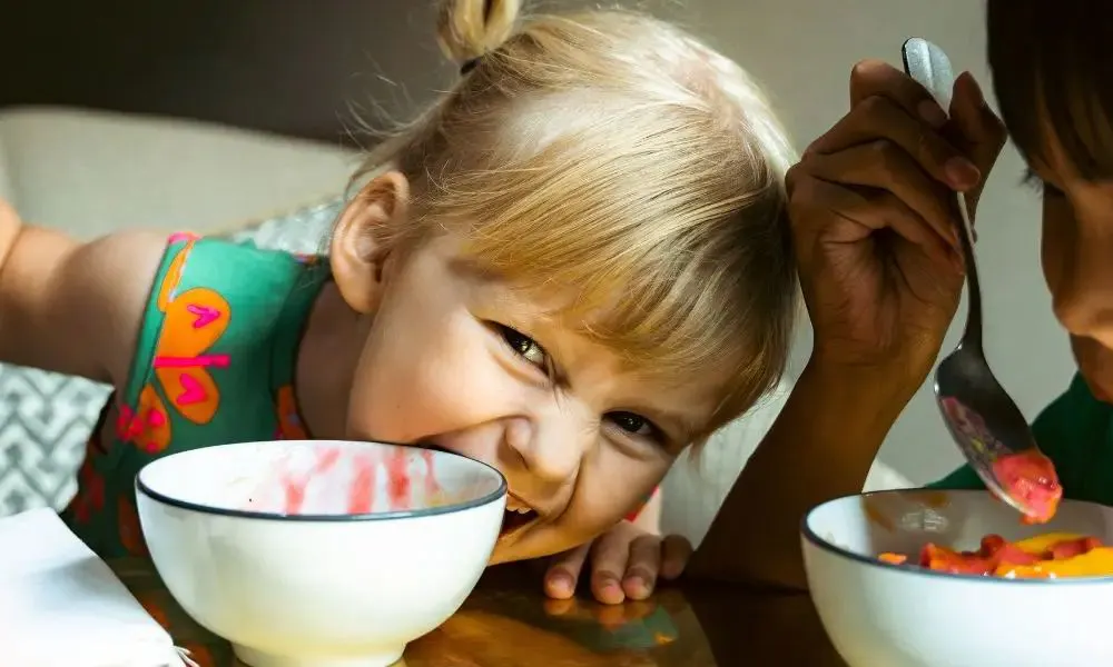 Kids eating at table