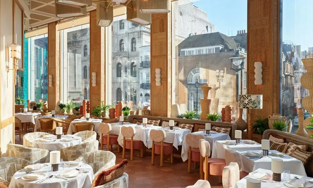 curved restaurant interior with floor-to-ceiling windows