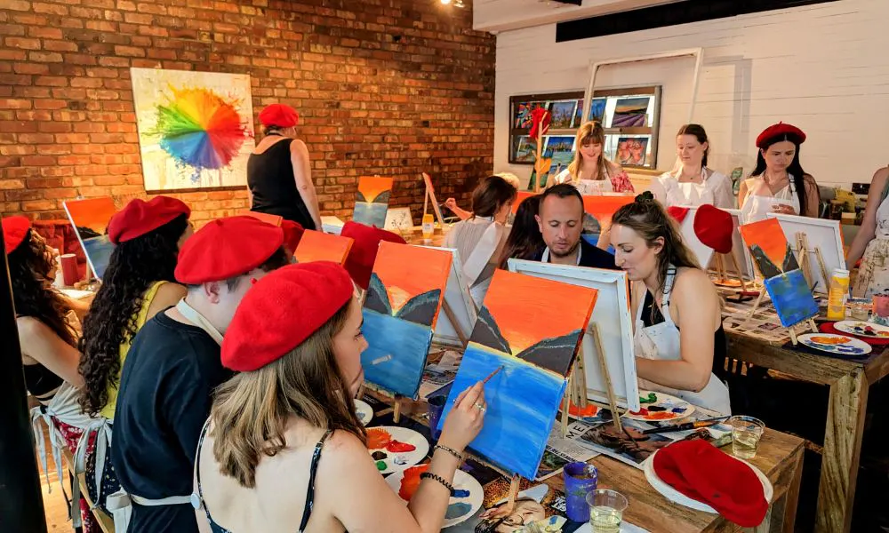 large painting class at art play