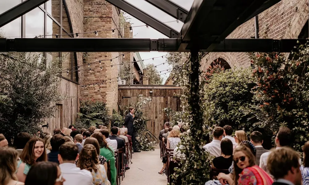 Outdoor wedding wedding with half covering