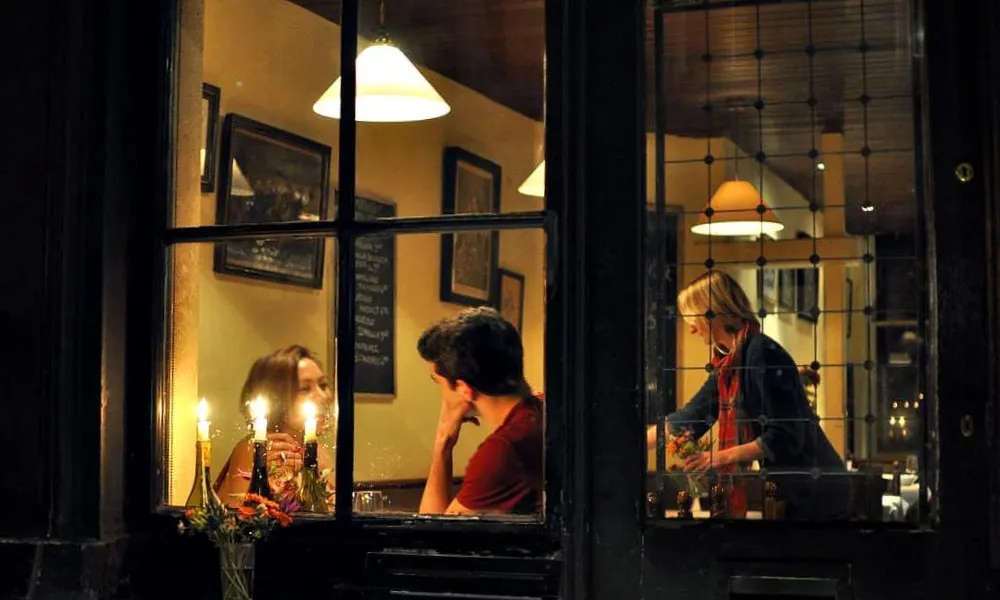 couple in window at andrew edmunds