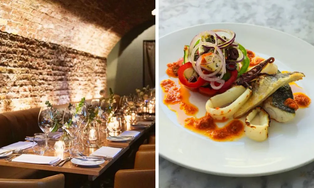 banquet table in tunnel restaurant space and fish with calamari and salad