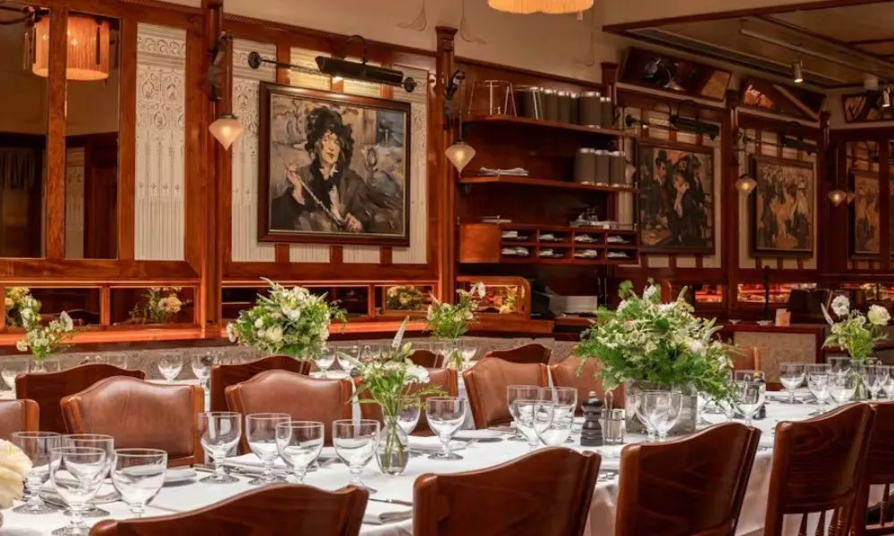 private dining room with banquet table for wedding reception in french restaurant